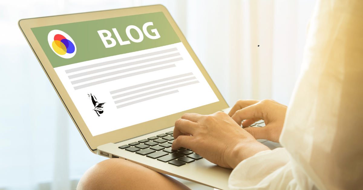 a person working on a blog on their laptop